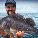 Man holding rockfish